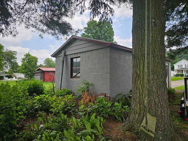 409 E Main St, Elkland, PA 16920 - view of home's exterior featuring concrete block siding