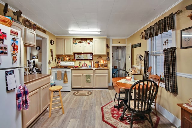 kitchen with light wood-type flooring, ornamental molding, white appliances, and sink