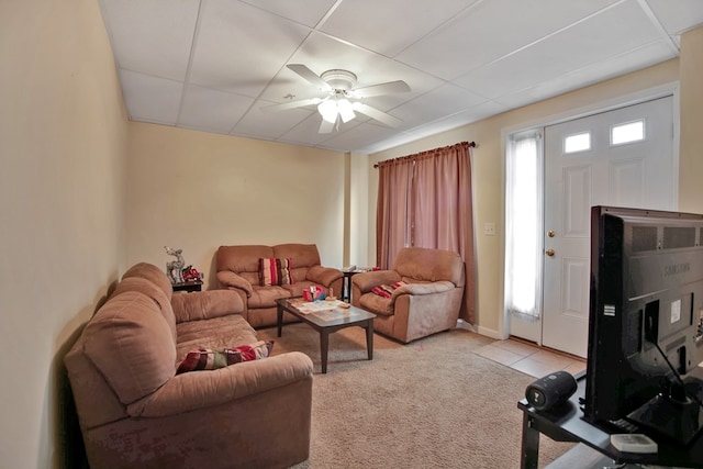 living room with light carpet and ceiling fan