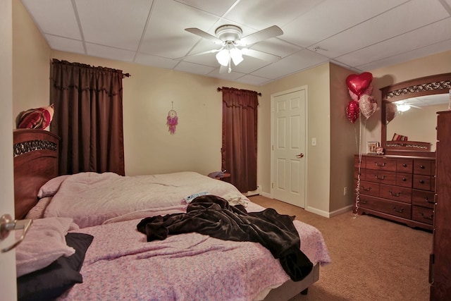 bedroom with light carpet and ceiling fan