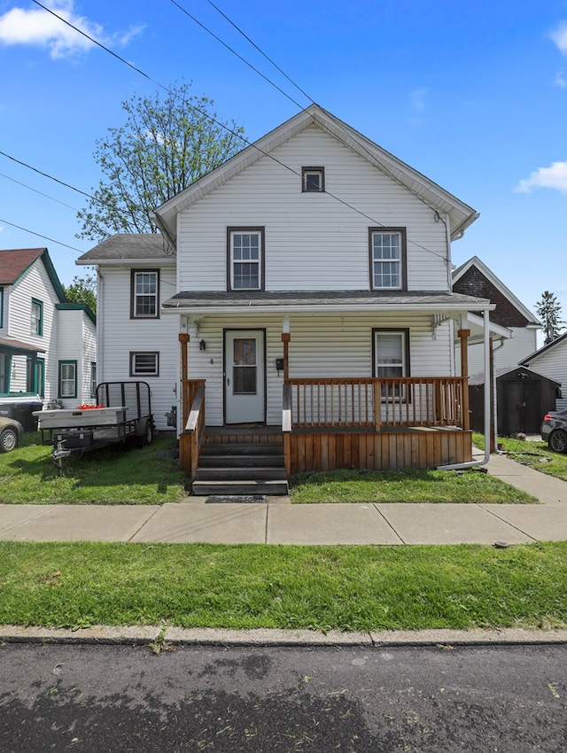 4 Pine St, Waverly, NY 14892 - view of front of home with a porch and a front lawn