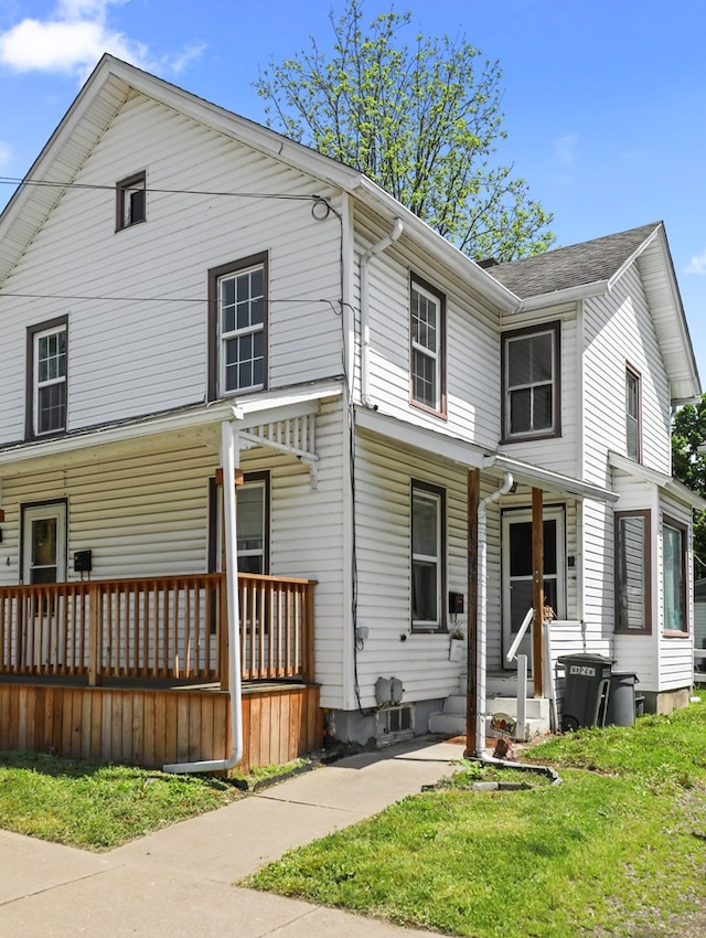 4 Pine St, Waverly, NY 14892 - view of front of house featuring covered porch and a front lawn