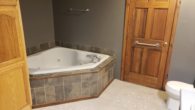 bathroom with tiled bath and toilet