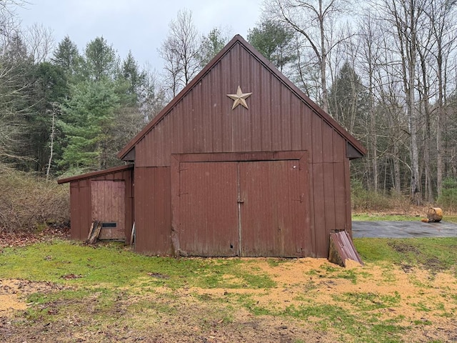 1918 Rte 414, Morris, PA 16938 - view of outdoor structure featuring an outbuilding and a wooded view