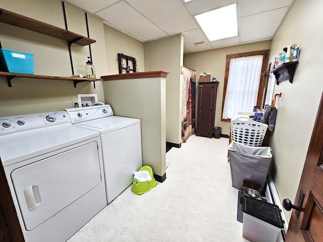 washroom featuring light colored carpet and independent washer and dryer