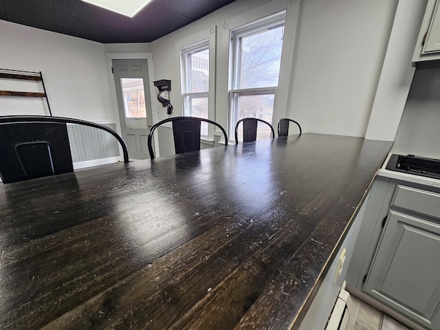 dining room with a paneled ceiling