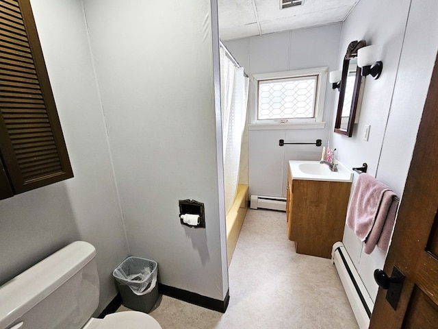 full bathroom featuring vanity, toilet, baseboard heating, and shower / tub combo with curtain