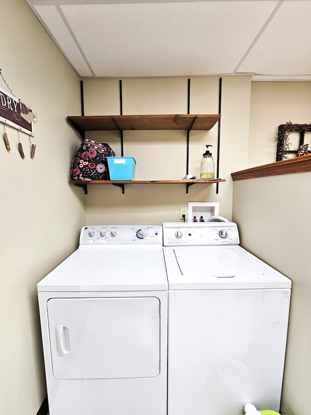 washroom with separate washer and dryer