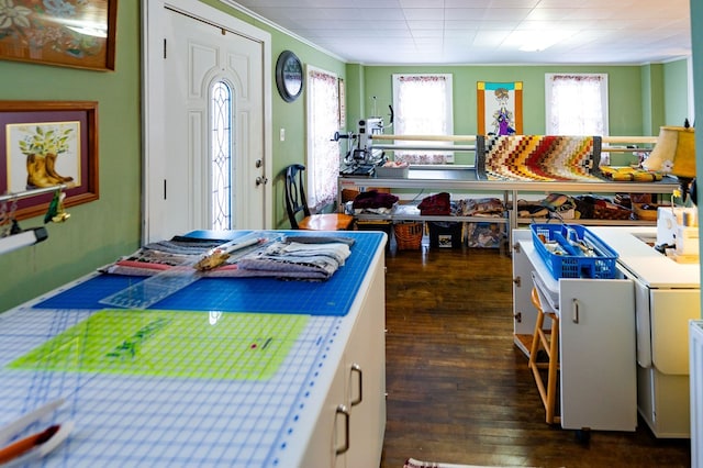 kitchen featuring white cabinetry and dark wood-type flooring