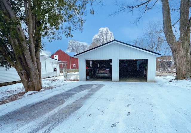 view of snow covered garage