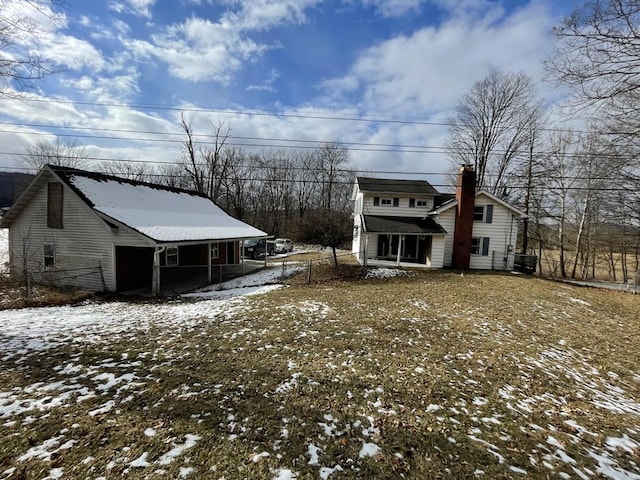 view of snow covered property