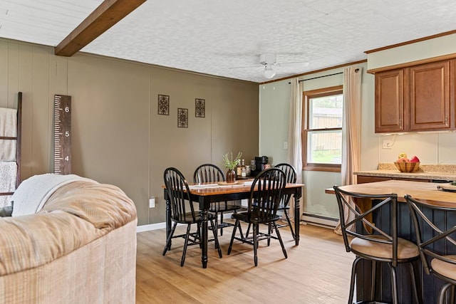 118 Milton Ln, Warren Center, PA 18851 - dining space with light wood-style floors, crown molding, a baseboard heating unit, and beamed ceiling