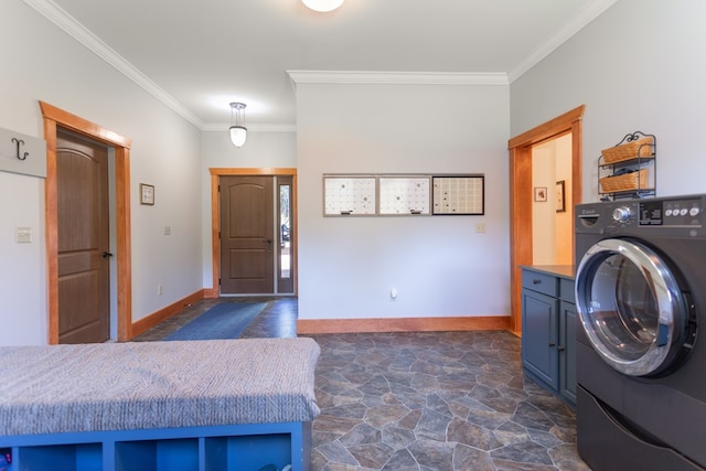 laundry area featuring washer / clothes dryer and ornamental molding