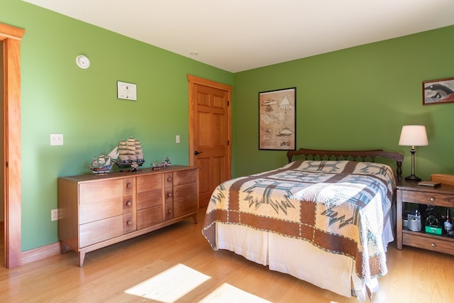 bedroom with light wood-type flooring