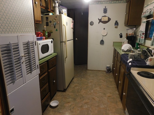 kitchen featuring white appliances