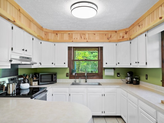 543 Drybrook Rd, Waverly, NY 14892 - kitchen with stainless steel electric range, under cabinet range hood, a sink, a textured ceiling, and light countertops