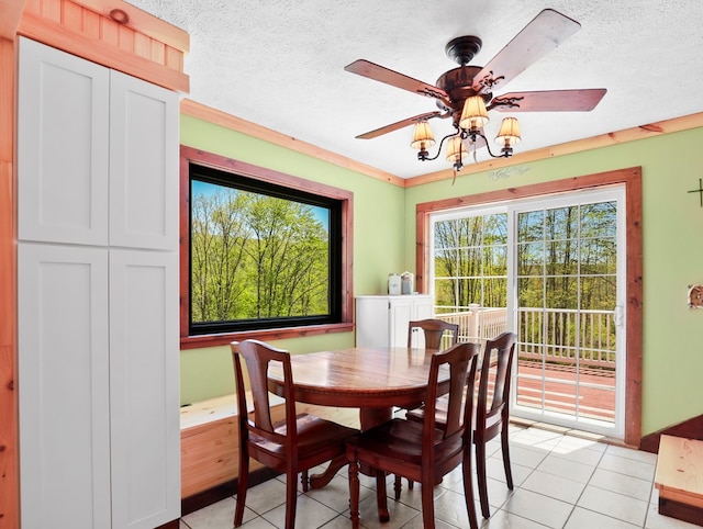 543 Drybrook Rd, Waverly, NY 14892 - dining area featuring light tile patterned floors, ceiling fan, and a textured ceiling