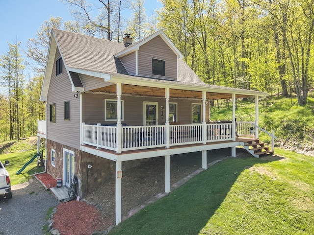 543 Drybrook Rd, Waverly, NY 14892 - view of front of home with a shingled roof, a front lawn, and a chimney