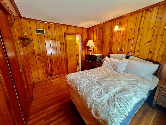 bedroom featuring dark wood-type flooring