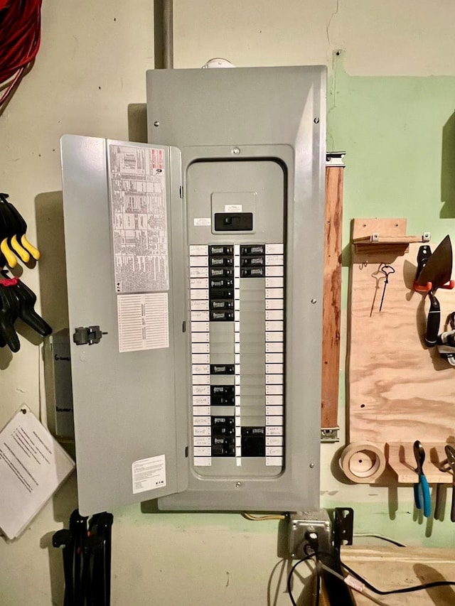 utility room featuring electric panel