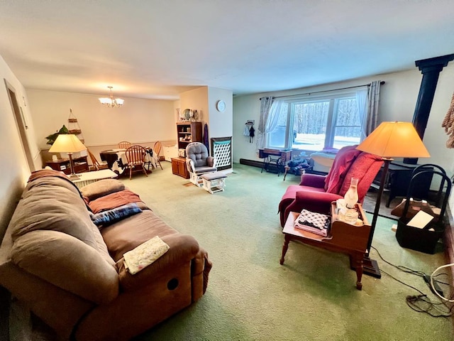 carpeted living room with a notable chandelier