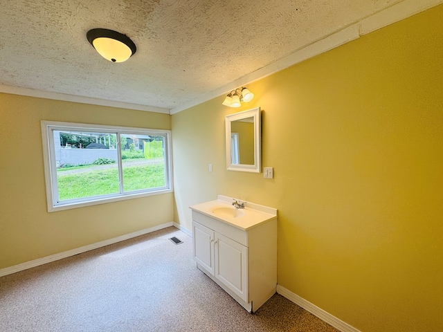 96 E St, Towanda, PA 18848 - bathroom featuring baseboards, vanity, and a textured ceiling