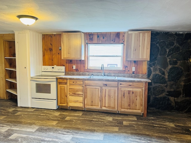 96 E St, Towanda, PA 18848 - kitchen featuring white electric stove, a sink, dark wood-style flooring, and wooden walls
