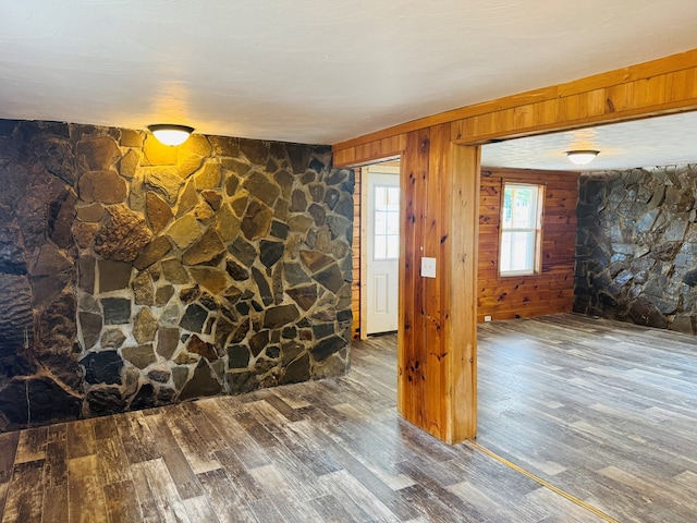 96 E St, Towanda, PA 18848 - empty room with wood finished floors and wood walls