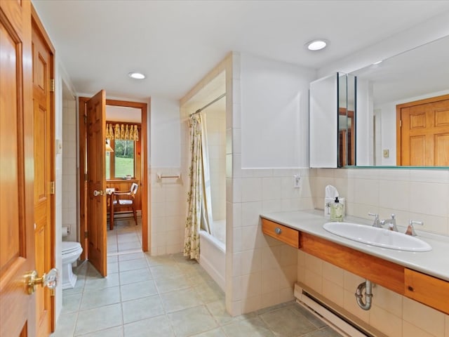 full bathroom with tile patterned floors, sink, toilet, shower / bathtub combination with curtain, and tile walls