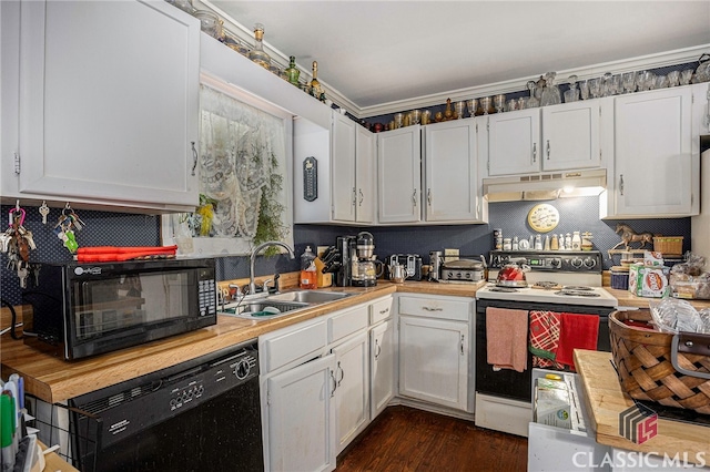 kitchen with white cabinetry, custom exhaust hood, black appliances, and sink