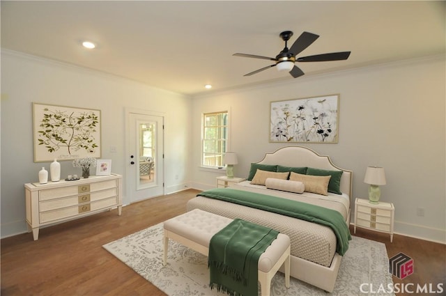 bedroom featuring ceiling fan, ornamental molding, access to exterior, and wood-type flooring