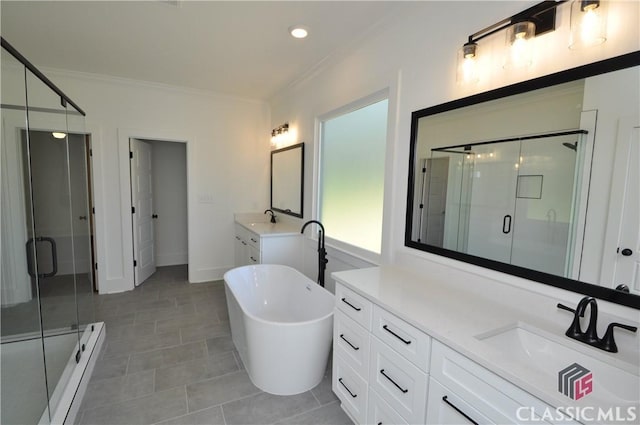 bathroom featuring tile patterned flooring, ornamental molding, shower with separate bathtub, and vanity