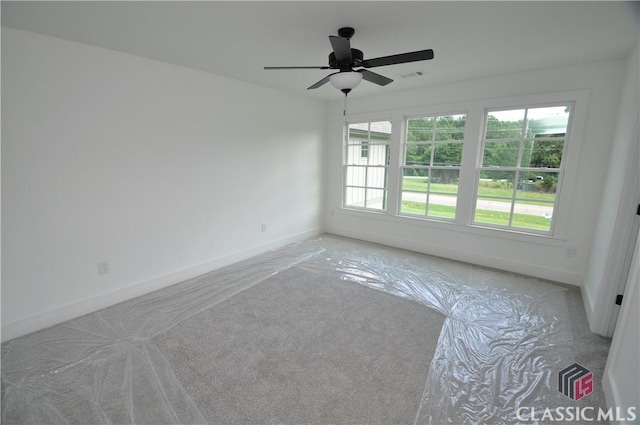 spare room featuring ceiling fan