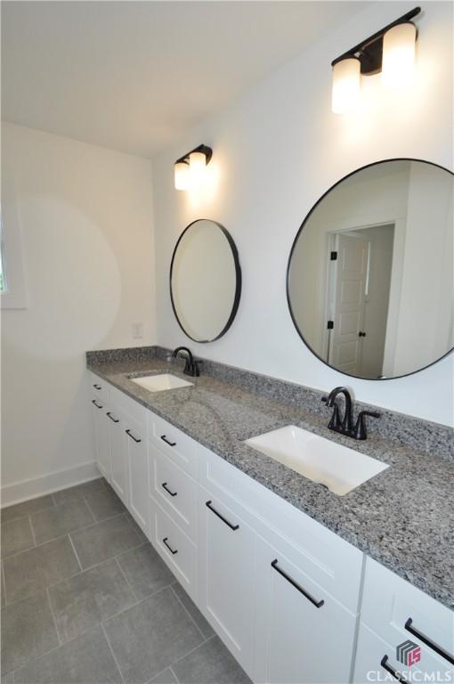 bathroom featuring vanity and tile patterned floors