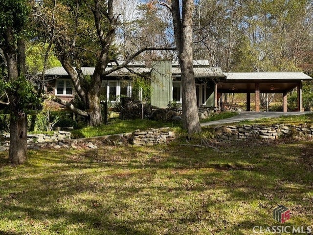 exterior space with a lawn