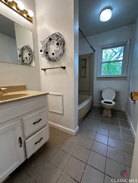 full bathroom featuring bathing tub / shower combination, vanity, and toilet