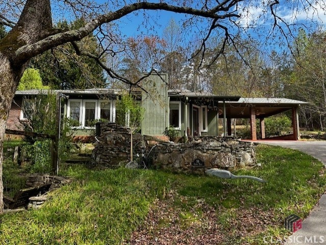 view of front of house with a carport