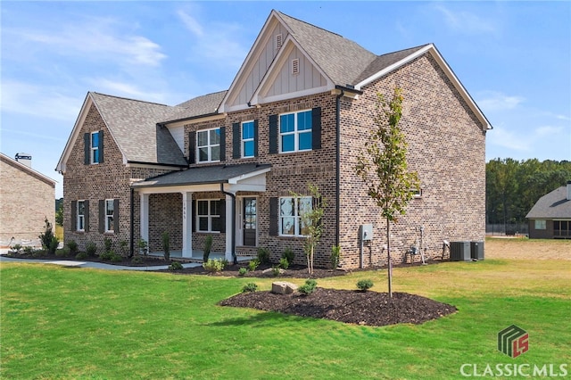 craftsman-style home with a front yard