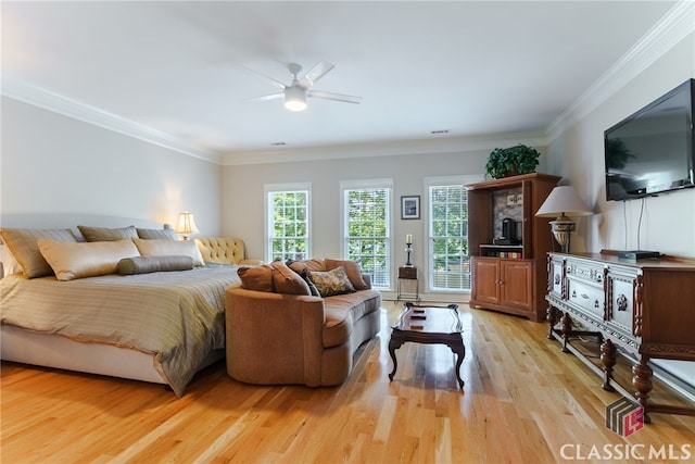 bedroom featuring light wood-type flooring, access to outside, ceiling fan, and crown molding