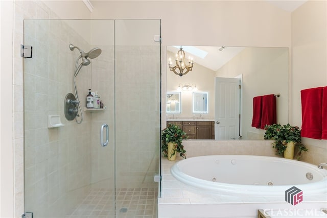 bathroom featuring a chandelier, lofted ceiling, vanity, and independent shower and bath