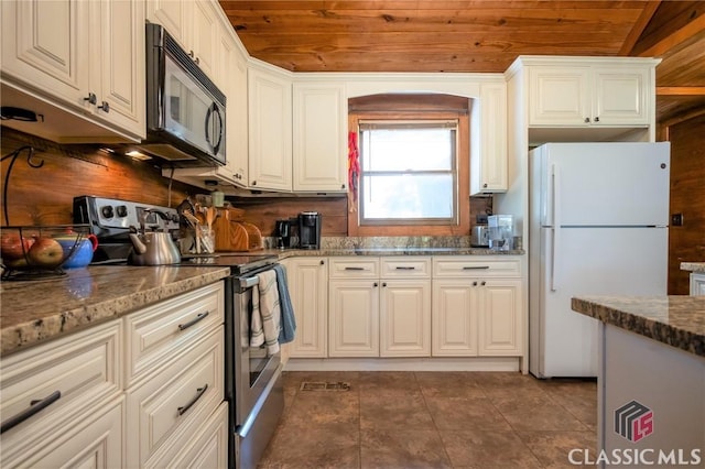 kitchen with wooden ceiling, white refrigerator, electric stove, light stone counters, and white cabinetry