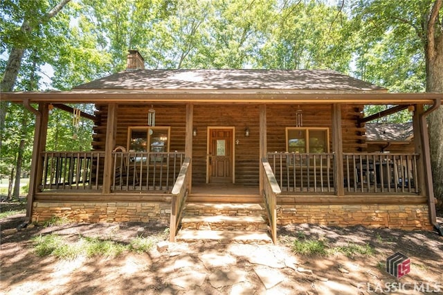 exterior space featuring covered porch