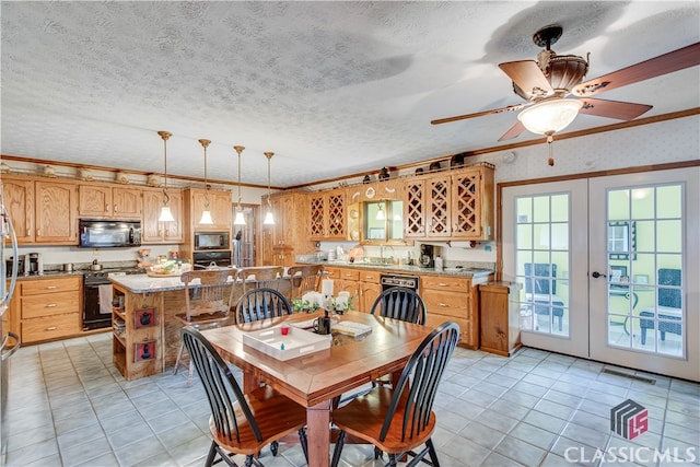 dining room featuring french doors, a textured ceiling, ceiling fan, and light tile flooring