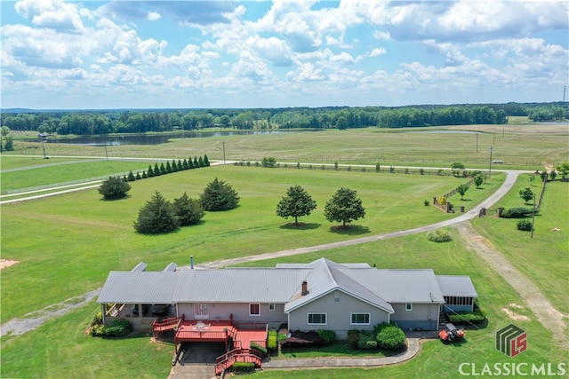 birds eye view of property with a rural view