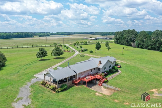 birds eye view of property with a rural view