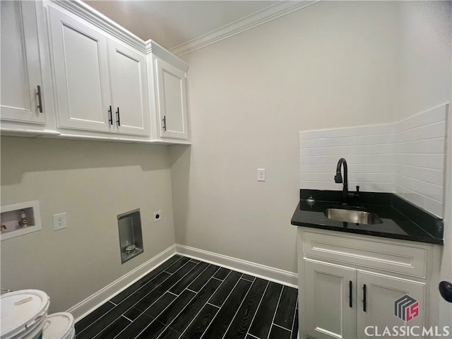 laundry area with crown molding, cabinets, dark wood-type flooring, hookup for a washing machine, and sink