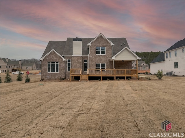 view of front of home with a deck