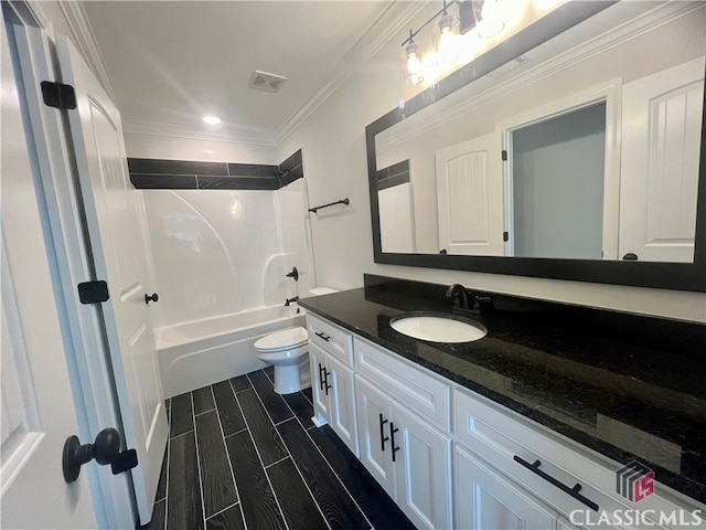 full bathroom with shower / tub combination, crown molding, toilet, and large vanity