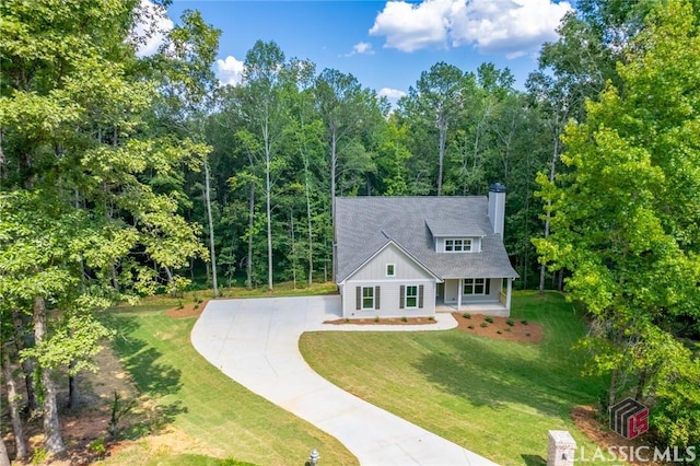 view of front of home with a front yard