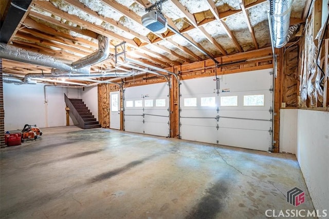 garage featuring a garage door opener